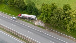 Overturned truck after colliding with a car