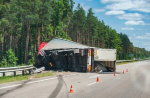 Truck overturned after an accident on the road